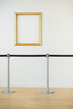 Blank picture frame in empty art gallery