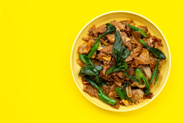 Dish of stir fried flat noodle and pork with soy sauce