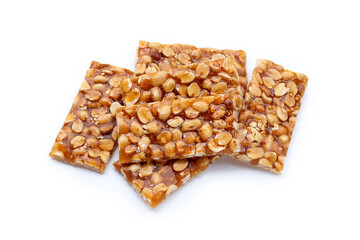 Honey bars with peanuts on white background