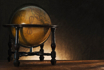 Close up of antique globe on table