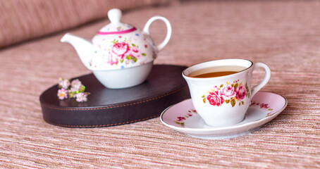 Fototapeta na wymiar cup of tea and teapot