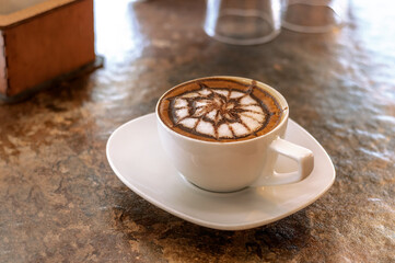 cup of coffee with beans