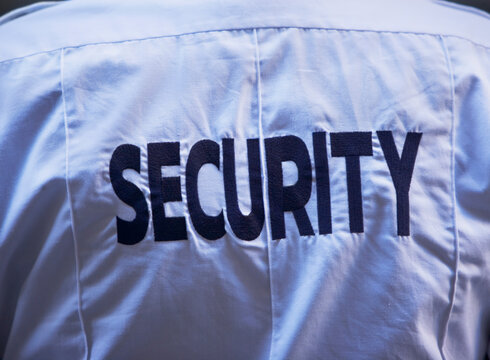 Back of security guard`s shirt