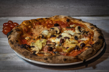 pizza with mushrooms, olives and cheese