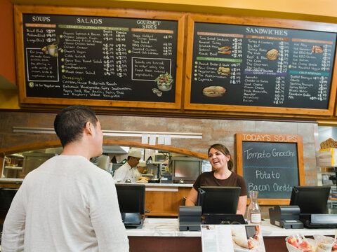 Customer ordering food at bakery