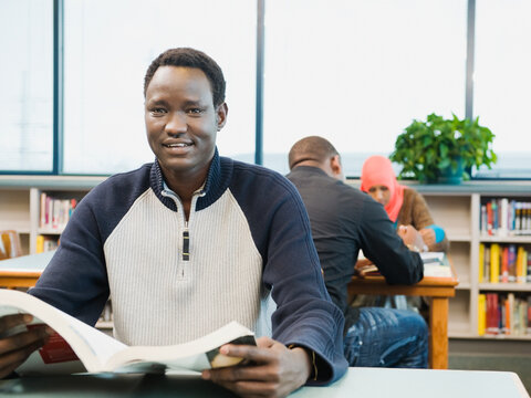 Adult sitting at desk at learning center