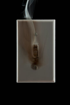 Smoke emanating from an electrical switch