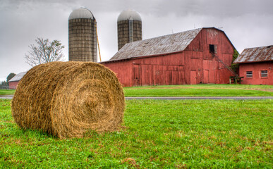Red barn with dual silos © Doug