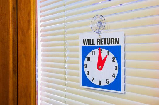 Closed sign on office door
