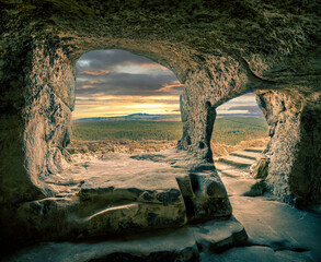Majestic view of a historical cave from inside with a beautiful nature scene in Blankenburg