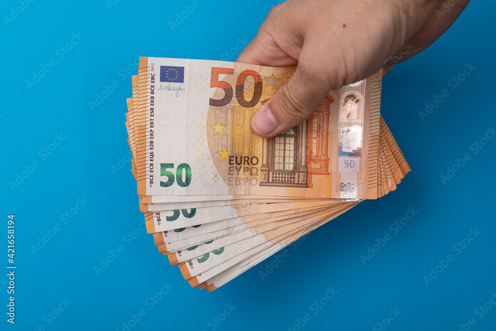 Wall mural concept euro banknote in hand