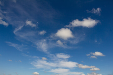 Obraz premium Beautiful white clouds on the blue sky. Resource for designers.