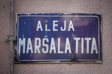 Street sign of Aleja Marsala Tita, meaning Marshall Tito alley in Serbian language. It is the main...