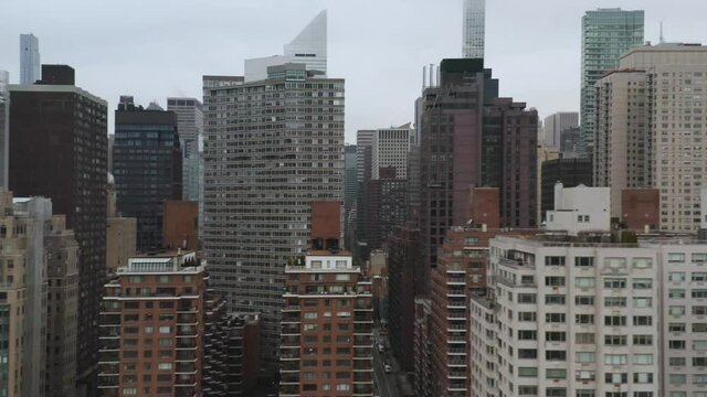 4K Right Lateral Aerial low to high NYC Midtown East Skyline on Overcast Morning