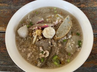 close up noodle soup on wooden table