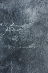 Textured blue background from textured fabric in vertical view