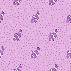 Doodle hand drawn seamless pattern with simple clown fish ornament. Dotted background. Exotic aqua print.