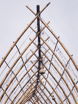 Vertical Shot Of A Bamboo Art Installation Outdoor