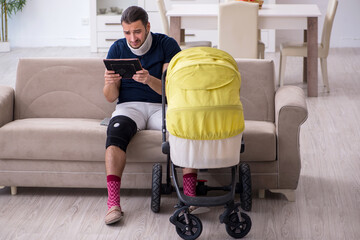 Young injured man looking after newborn in unrequited love