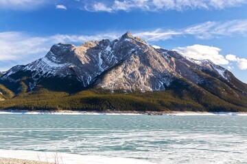Mount Michener, Rocky Mountain Peak and Frozen Abraham Lake in Alberta Foothills.  Sunny Early...