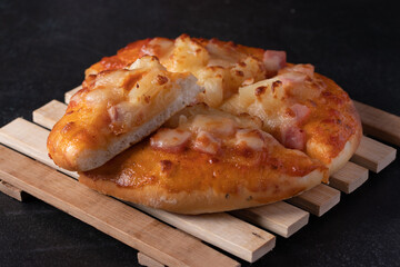 Three american style pizzas, Hawaiian thick crust pizza