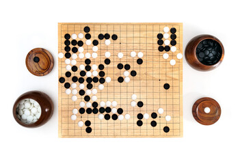 Goban, Baduk, Weiqi or Maklom - Traditional asian strategy board game. black and white stone of Chinese board game