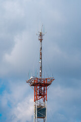 Communication tower with sky background. Internet antenna