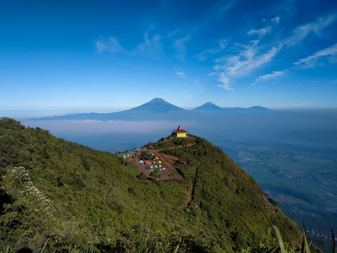 Panoramic View Of Building And Mountains Against Sky. Mount Andong, Indonesia