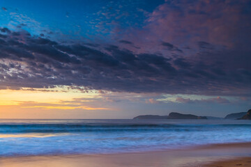 Fototapeta na wymiar Sunrise seascape at the beach with haze and cloud