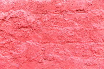 Fuchsia stone wall. Exterior of an old building. Background. Space for text.