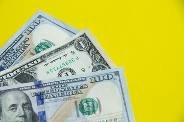 Dollars on yellow background American currency