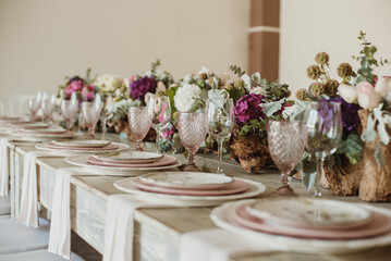 Flower table decorations for birthdays and wedding dinner. event, party or wedding reception in outdoor restaurant.