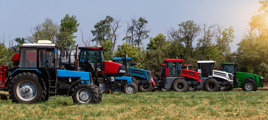 Agricultural machinery park on the field.	
