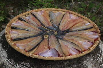 Sun-dried catfish. Food preservation by means of drying in the sun.