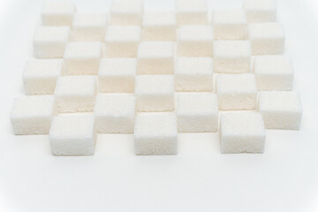 sugar cubes staggered candy ingredient glucose light background
