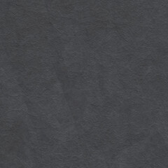 A dense industrial sheet of paper with a textured surface