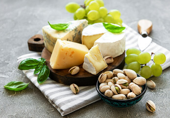 Various types of cheese and snacks
