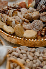 Dried fruits, nuts and berries laid out on the table