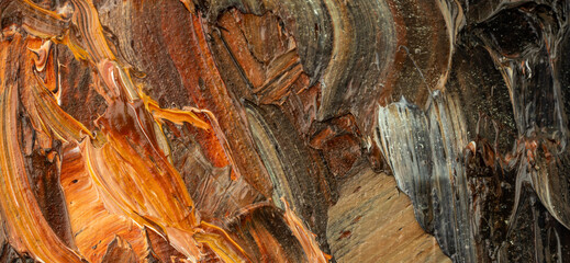 Embossed pasty oil paints and reliefs. Primary colors: ocher, brown, black.  Abstract art.