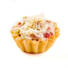 Isolated salty appetizer tartlet on the white background