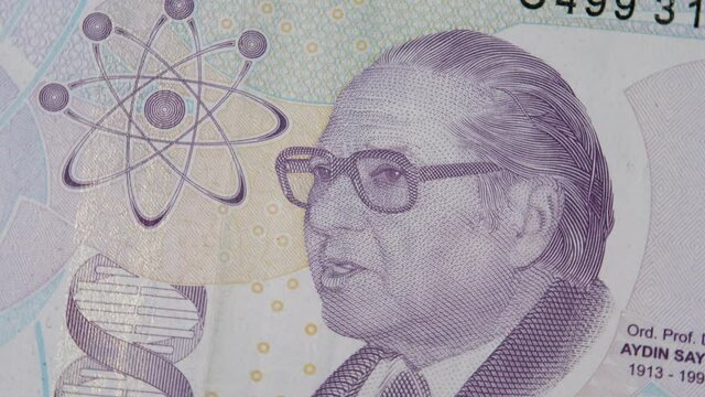 Portret of historian of science Aydin Sayili on reverse of purple 5 Turkish lira banknote