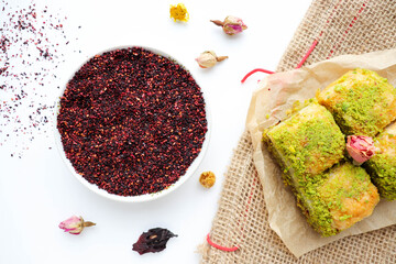 oriental sweets. traditional Turkish baklava with pistachios and pomegranate tea