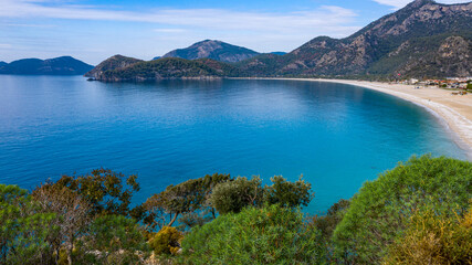 Fototapeta premium A fascinating view that has the unique nature of Oludeniz which is a county of Fethiye in Turkey. Because of its warm climate and fresh air, it has been an important destination to visit for tourists.