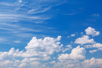 Puffy immaculate white clouds . Calmness on the sky in the summer 