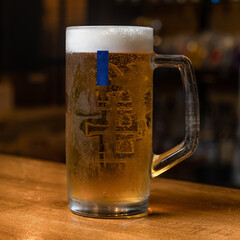 Fresh cold beer on bar desk
