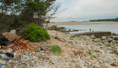 Plastic garbage by the sea. Environment concept. Environmental problem of plastic rubbish pollution in ocean.
