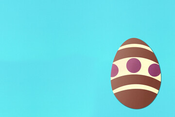 Easter eggs on light blue background. Colorful. Paper texture. Illustration.