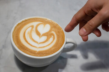 A cup of latte on the table