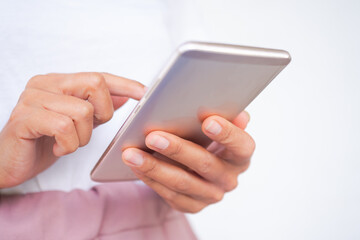 Hand woman using mobile or smartphone for shopping online and chat to freind with internet digital on white background. technology for life style concept.