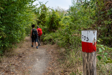 Two women hiking in the Parco regionale della vena del gesso romagnola. Brisighella, Borgo Rivola,...